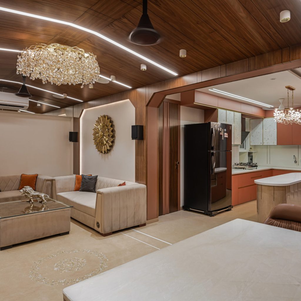 crystal chandelier with an open kitche done with acrylic and beautiful beige italian marble